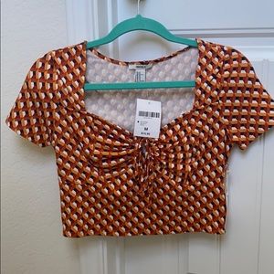 Rust colored crop top.